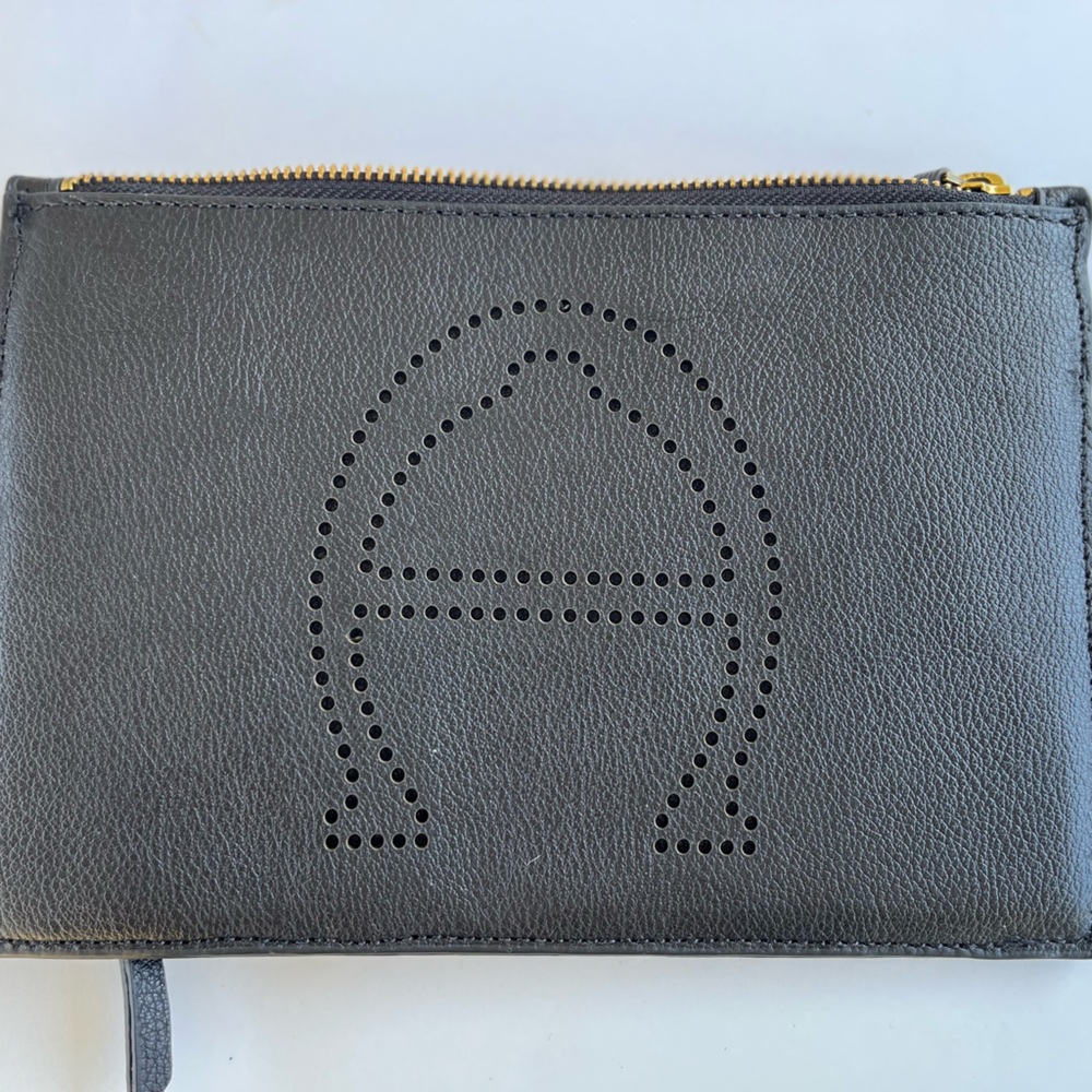 Etienne Aigner black leather clutch